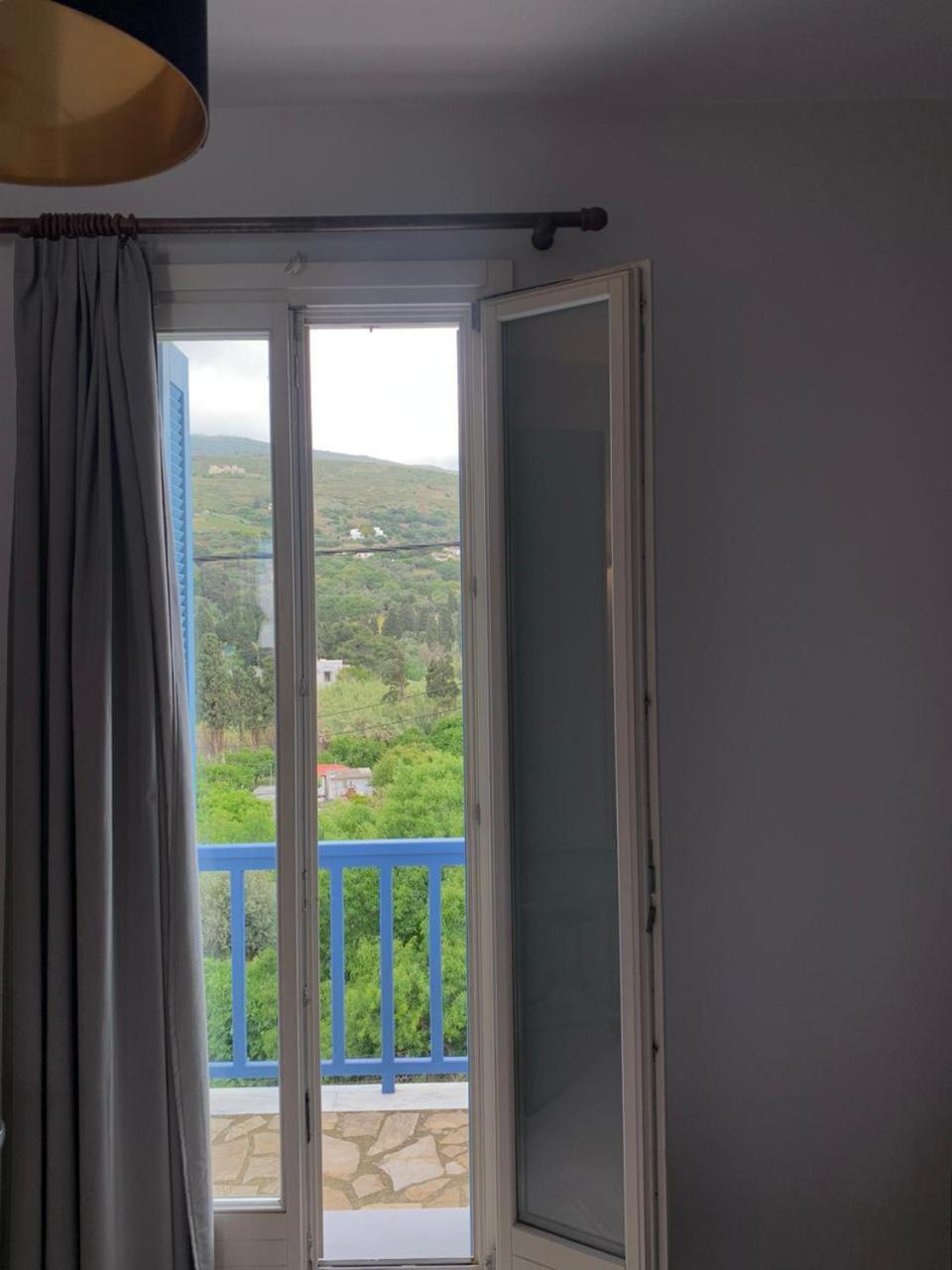 Andros Guesthouses Esterno foto
